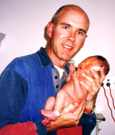 Being a Dad - Cradling newborn son (2002)